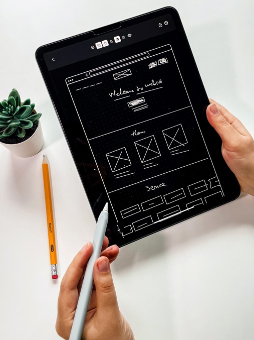 Web theme is drawing by woman with the stylus