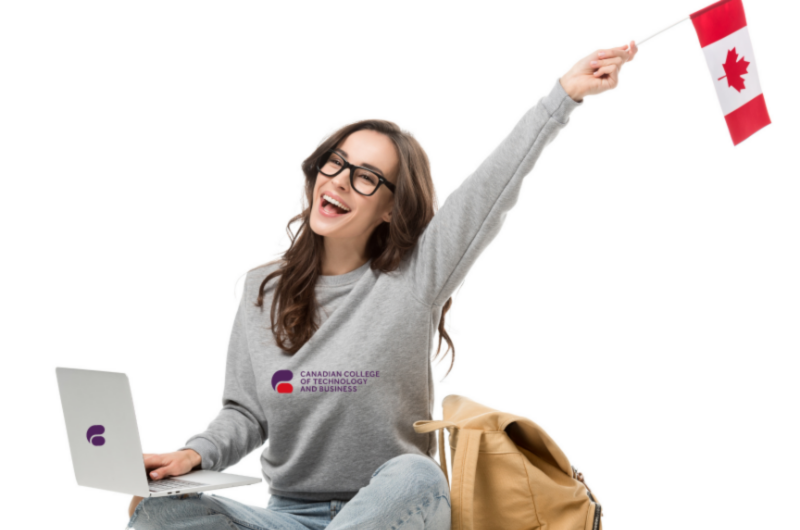 Girl holds laptop and Canadian flag