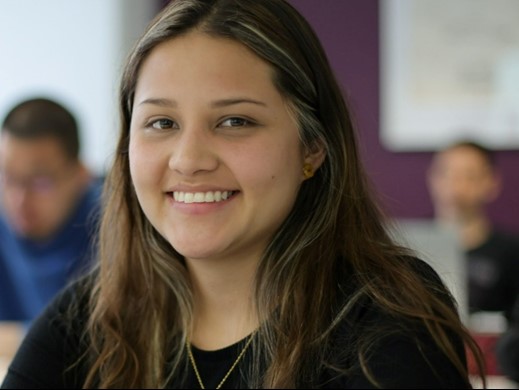 Woman smiling, posing for photo