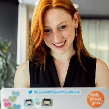 Woman smiling, posing for photo