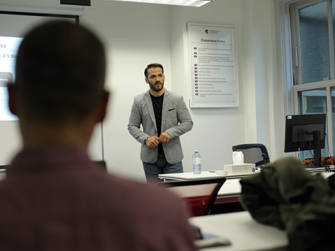 Mustafa Syed - presenting and explaining