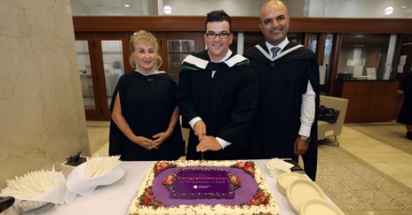 Graduation ceremony celebration - Cake cutting, posing for photo