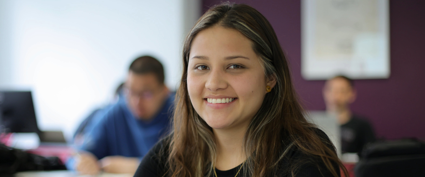 Woman posing, smiling