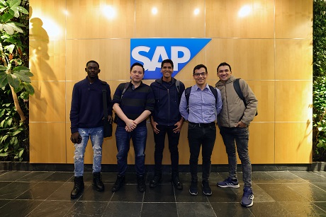 Group smiles, Visited SAP - Vancouver, posing for photo