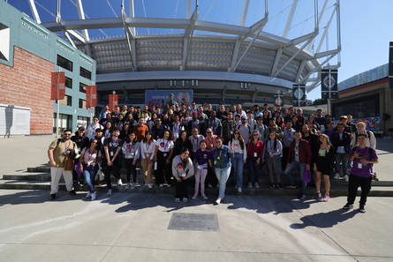 Group smiling, posing for the photograph